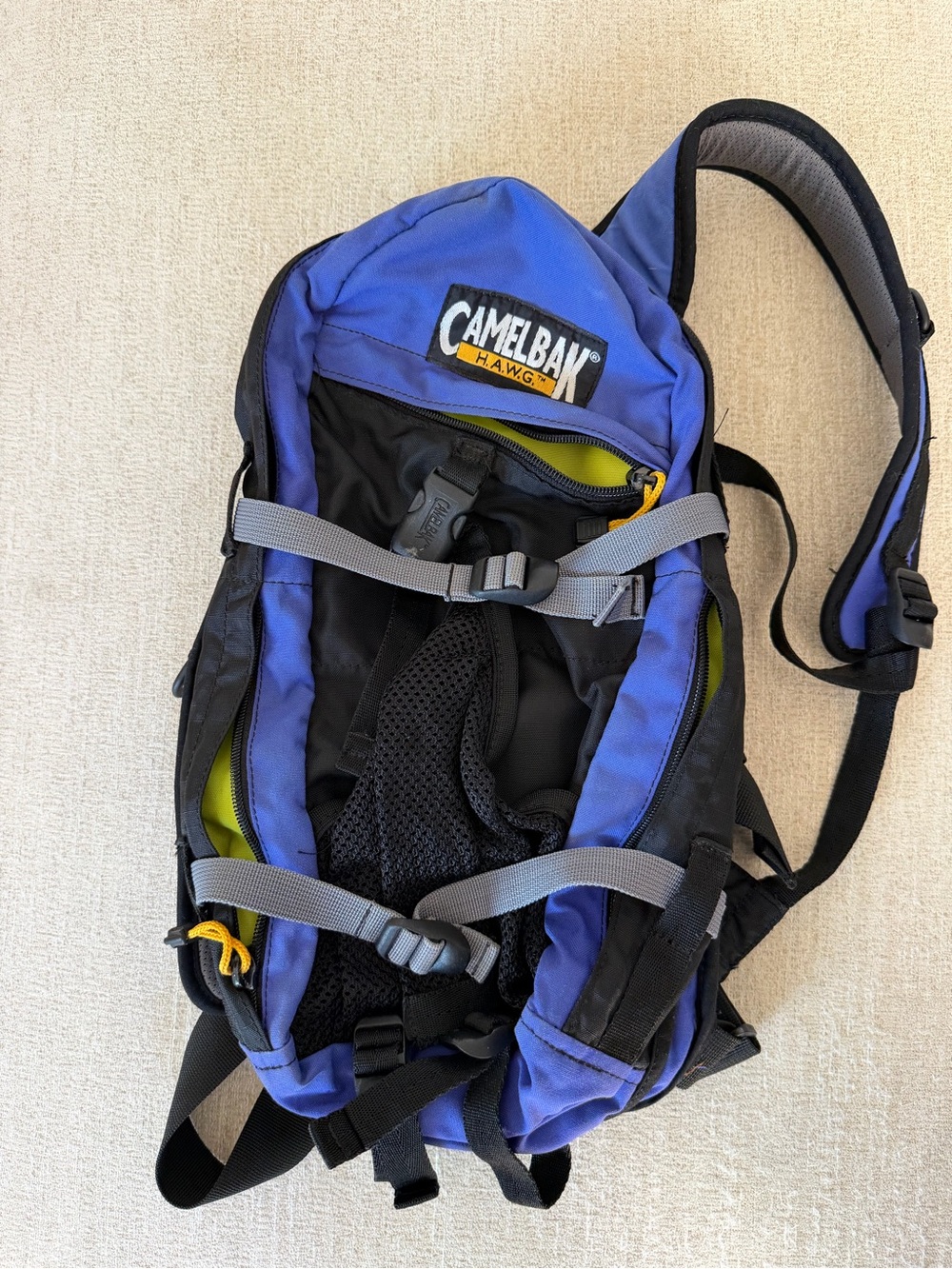 CamelBak Hawg Sling Pack in Purple and Black with Yellow Accent